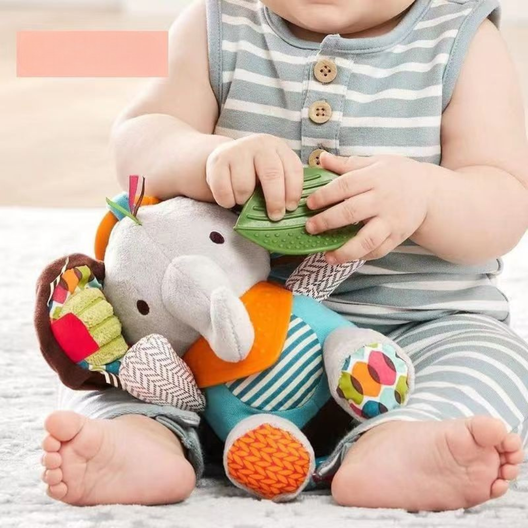 Sensory baby plush toy with rattle and silicone attachment for teething