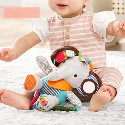Sensory baby plush toy with rattle and silicone attachment for teething