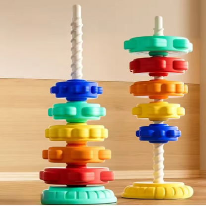 Rainbow spinning and colour tower toy