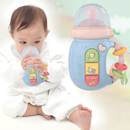 Musical baby dummy with teething ring and rattles