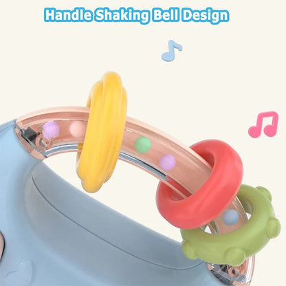 Musical baby dummy with teething ring and rattles